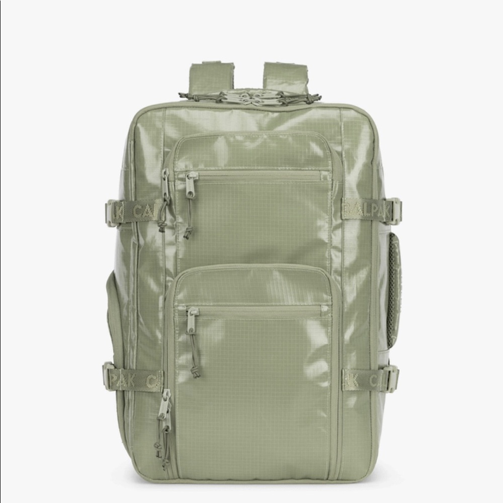 Calpak 26L laptop backpack duffel in color juniper.
